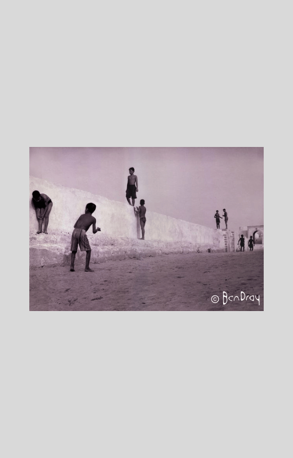 El Jadida, Morocco 1998. Children play on the ramparts of El Jadida Fort Morocco. When the tide is in, they jump from this wall into the sea